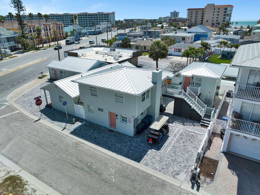 Prime Investment Opportunity: Fully Renovated ~ 8 unit ~ Airbnb Property Steps from the Beach
Nestled less than 450 feet from public beach access, this exceptional property offers an unparalleled opportunity for short-term rental success. Zoned Commercial Tourist Facilities (CTF), it is approved for nightly rentals, making it the perfect choice for an investor looking for passive income along the Gulf Coast Beaches.

Property Highlights;

Complete Renovation: This property has been meticulously upgraded, including a durable aluminum PVD-plated roof, custom impact-resistant windows, and a full electrical rewire with new panels for optimal safety.
Gourmet Kitchens & Spa-Inspired Bathrooms. Each unit features a sleek, European-style kitchen with quartz countertops, glass backsplashes, and premium appliances. The bathrooms have been tastefully updated, new showers, vanities, and modern fixtures.

Premium Finishes: No detail has been overlooked, from the Stiebel tankless water heaters and new mini-split AC systems in 7 of the 8 units to the eco-friendly Cali bamboo long plank flooring.

Cohesive Aesthetic: Every unit shares a uniform, coastal luxury design with the same exquisite materials, including a newly installed permeable paver system and durable new stucco with advanced lathe for long-lasting results.

Outdoor Potential: The property is primed for additional amenities, with power already run underground for a 12-person hot tub in the beautiful central courtyard. There is also ample space to add a pool or spa/hot tub.

Ideal Location: Situated within a block of several popular restaurants and bars, this property also features 8 on-site parking spots for added convenience.

With its impeccable design, unbeatable location, and turn-key status, this property is a prime opportunity for generating substantial income through short-term rentals. Dont miss out on your chance to own this stunning slice of coastal paradise!

(PORTFOLIO PACKAGE AVAILABLE; Property can be purchased with 2116/2114 1st St, Indian Rocks Beach, and/or 2605 Bay Blvd, Indian Rocks Beach)