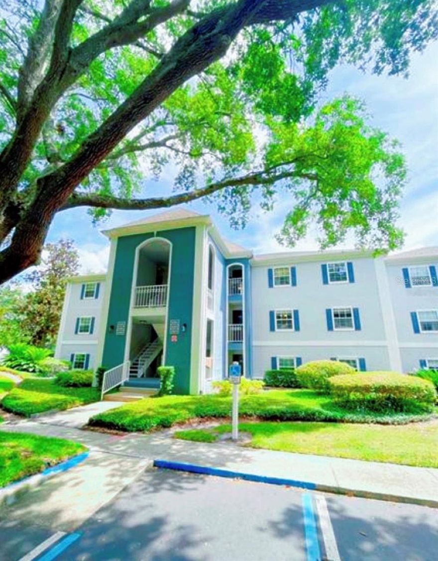 This is a wonderful second story home located in Clubside at Sabal Point with a great pond and fountain view. Tons of comfort and privacy, even a handicap spot and additional parking out front. This condo boasts 1,365 square feet, with 2 bedrooms and 2.5 baths. There's a large balcony or covered porch, and the great room with attractive dark wood laminate planks is simply huge. The open kitchen is tiled and located right off of the great room with lots of natural light, and it's a good size with eat-in space. At the far end of the great room, you’ll find two well-appointed primary bedrooms. The two primary bedrooms each feature an ensuite bathroom with granite countertops, one with a shower and one with a tub. There are large walk-in closets and linen closets on both sides so there’s plenty of storage in this home. Additional conveniences include a half bath for guests off of the foyer and a separate laundry room with shelves. Monthly fee covers all exterior maintenance and landscaping, water, sewer, and trash services. Check out the clubhouse, resort-style pool, tennis courts, fitness center, and car wash station. Excellent location near Wekiva Springs, very close to all the shopping in Altamonte Springs, Seminole County biking trails, churches and top-rated schools. Open some windows and breathe in the sweet Sabal Point canopy air, it's all ready to move in condition and sold as-is. Contact us today to schedule a tour!