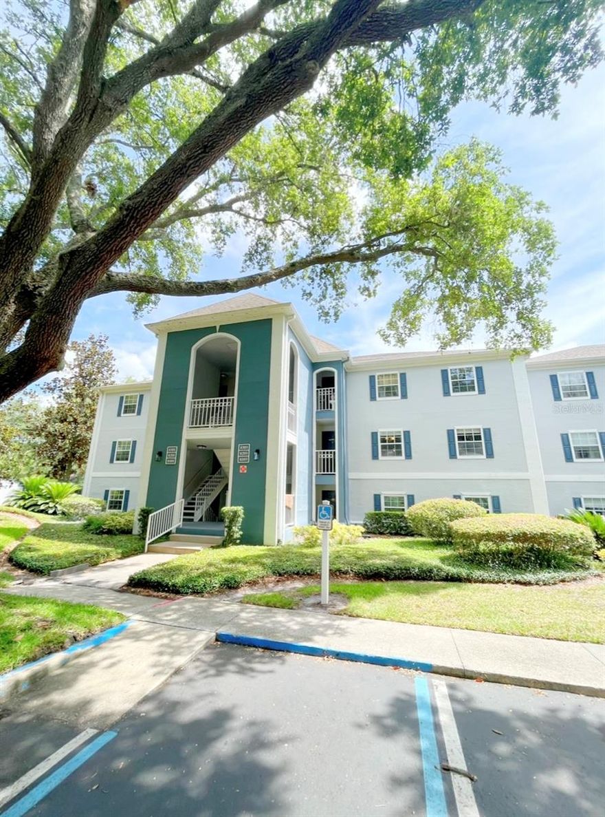 This is a wonderful second story home located in Clubside at Sabal Point with a great pond and fountain view. Tons of comfort and privacy, even a handicap spot and additional parking out front. This condo boasts 1,365 square feet, with 2 bedrooms and 2.5 baths. There's a large balcony or covered porch, and the great room with attractive dark wood laminate planks is simply huge. The open kitchen is tiled and located right off of the great room with lots of natural light, and it's a good size with eat-in space. At the far end of the great room, you’ll find two well-appointed primary bedrooms. The two primary bedrooms each feature an ensuite bathroom with granite countertops, one with a shower and one with a tub. There are large walk-in closets and linen closets on both sides so there’s plenty of storage in this home. Additional conveniences include a half bath for guests off of the foyer and a separate laundry room with shelves. Monthly fee covers all exterior maintenance and landscaping, water, sewer, and trash services. Check out the clubhouse, resort-style pool, tennis courts, fitness center, and car wash station. Excellent location near Wekiva Springs, very close to all the shopping in Altamonte Springs, Seminole County biking trails, churches and top-rated schools. Open some windows and breathe in the sweet Sabal Point canopy air, it's all ready to move in condition and sold as-is. Contact us today to schedule a tour!