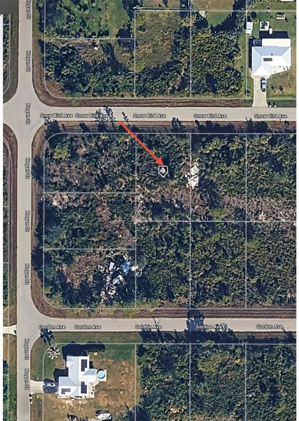 Photo of 12081 Snow Bird Avenue, Port Charlotte, FL 33981 (MLS # O6384151)