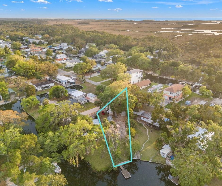 Waterfront Lot with Dock & RV Option – Ready for New Construction in Weeki Wachee!
Discover the perfect opportunity to build your dream home on this prime waterfront lot with direct access to the beautiful Weeki Wachee River. This cleared property, where a previous home has been professionally demolished, is fully prepped and ready for new construction.
Enjoy the best of Florida living with a private seawall and dock—ideal for fishing, kayaking, or simply relaxing as manatees glide by in your backyard. All major utilities are already in place, including water, sewer, and electric, making the building process that much easier.
A large storage shed on-site provides immediate space for tools and gear, and for those wanting to enjoy the property right away, the seller is open to selling the RV, allowing you to stay on-site while you build.
Located in a quiet, desirable area with easy access to the Gulf, Weeki Wachee Springs, Local Restaurants, Shops, Rogers Park, Linda Pederson Park which hosts a Kayak launch and Fishing Peir on Jenkins Creek. Enjoy all the natural beauty the Nature Coast has to offer—this is a rare chance to create your personal waterfront retreat.
Don’t miss out on this build-ready slice of paradise—schedule your showing today!