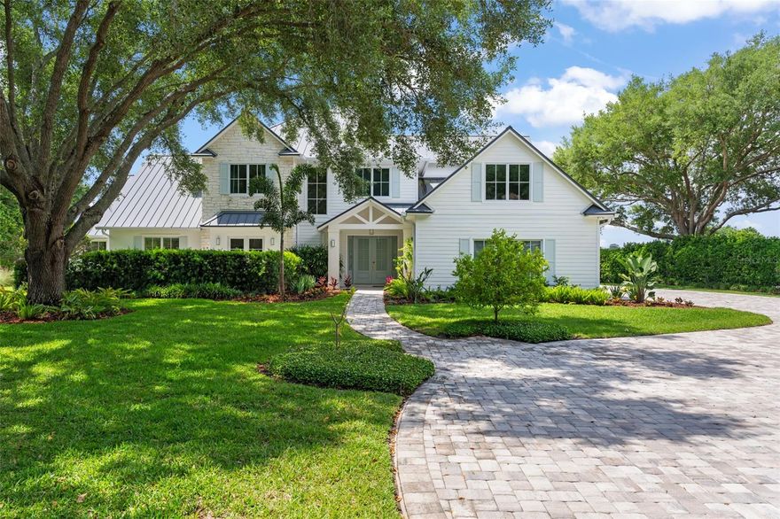 A New Standard of Luxury...Welcome to 13542 Sunset Lakes Circle, the 5,450 square foot crown jewel of Sunset Lakes in highly sought after Winter Garden, set on 1.19 acres of pristine spring-fed Lake Roper lake frontage. Boasting the largest homesite in the community, this 2023 Sorenson Construction reimagined modern farmhouse features a no-expense-spared custom whole home renovation, including a new standing-seam metal roof, all-new windows, new enlarged pool, and high-end designer light fixtures throughout. 


From the moment you arrive, you’re surrounded by sweeping landscapes: a meandering hand-laid paver driveway and motor court, framed by mature canopy oaks and lush tropical gardens. Inside, you’re greeted by an open concept layout that centers around piercing lake views and a main level that unfolds effortlessly. Meticulous attention was given to the world-class chef's kitchen, which includes an oversized island with seating for six, integrated Miele appliances, a coveted pot filler, an artisan tile backsplash, and custom floor-to-ceiling cabinetry adorned with brushed-gold hardware. An open-concept dining and great room, complete with oak flooring, a stone fireplace, built-in cabinetry, and a tongue-and-groove ceiling highlighted by warm wood beams, creates a charming sense of belonging. The first-floor primary suite is its own sanctuary with a dramatic floating bed wall, a tray ceiling with decorative crossbeams, and direct access to the pool and lakeside terrace. The marble-esque spa bath offers a frameless walk-in shower, freestanding soaking tub, dual vanities, and a custom, handcrafted 11x26 walk-in closet. A dedicated and fully equipped exercise room lies behind French doors, with access to a courtyard perfect for outdoor yoga or morning coffee, an elegant powder room, a separate mudroom, and a full laundry. The upper level is built with multi-generational living in mind: three generous en-suite bedrooms, each private and impeccably finished with designer wallpaper touches; a flex room and a dedicated study; an open loft for gathering; and a fifth bedroom/game room, complete with custom-built-in bunk beds. The exterior of the home is unrivaled in the market with expansive zero-edge sliding glass doors dissolving the boundary between interior and exterior, opening to a full, expansive covered summer kitchen complete with built-in grill, dishwasher, beverage cooler, bar seating, and full pool bath. Beyond the motorized retractable screens awaits your elevated resort-caliber pool and spa framing the lake, and a private boat dock complete with electric boat cover and lift providing immediate access to Lake Roper, a world-renowned ski lake. A three-car garage accommodates everything from extended family needs to dedicated collecting. Additional notable features include, built in surround sound, three TV's, remote programmable lighting and European toilets.


Ideally situated with effortless access to SR-429, historic Winter Garden, Windermere, Orlando, and the world's most celebrated theme parks, this is truly an address without equal. Schedule your private tour today.