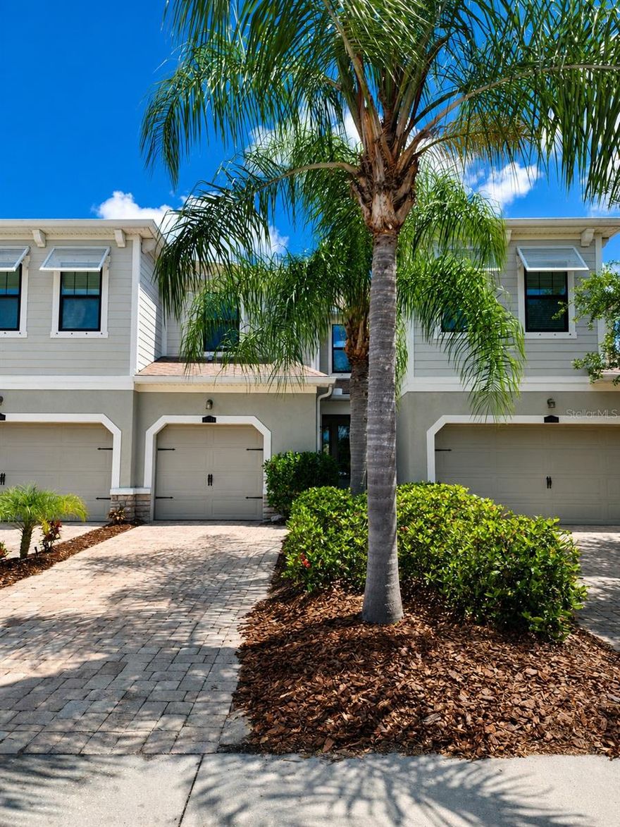 One year home warranty included with purchase! Move-in ready and beautifully updated, this 3-bedroom, 2.5-bath townhome in Harmony at Lakewood Ranch offers exceptional value and is priced below similar homes in the community that have not been updated like this one. Motivated seller wants this home sold quickly!

Recent upgrades include new recessed lighting throughout the first floor, new ceiling fans throughout the home, new stainless steel refrigerator, new luxury vinyl flooring on the stairs and throughout the entire second floor, updated primary bathroom, updated upstairs guest bathroom, new window treatments throughout, freshly painted garage floor with an epoxy-style finish, brand new lanai screens, general repairs and touchups throughout, plus a new AC system for added peace of mind.

The open-concept layout is perfect for everyday living and entertaining, while the spacious primary suite offers peaceful lake views and a beautifully updated en-suite bathroom. One of the standout features of this location is the abundance of guest parking conveniently located directly across the street, making it easy for visitors and gatherings. Also located just across the street is the resort-style community pool, fitness center, and clubhouse, creating a welcoming and active neighborhood atmosphere with convenient access to community amenities.

Harmony at Lakewood Ranch offers maintenance-free living with one of the lowest HOA fees in Lakewood Ranch, all within close proximity to shopping, dining, parks, walking trails, golf, top-rated schools, and everything the area has to offer. Professional photography coming soon!