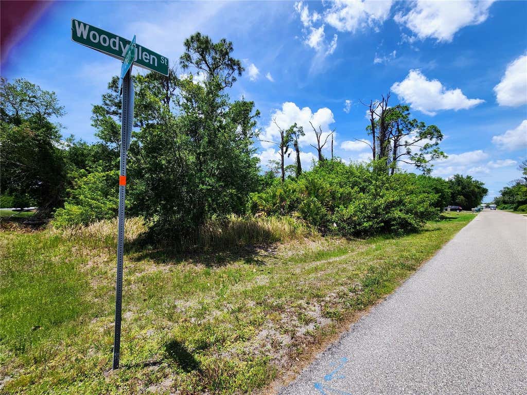 Photo of 2513 Woodyglen Street, Port Charlotte, FL 33948 (MLS # N6144281)