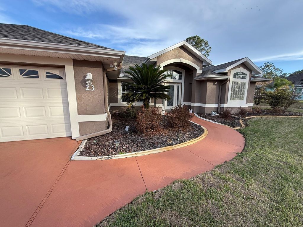Photo of 23 Evansmill Lane, Palm Coast, FL 32164 (MLS # FC316723)