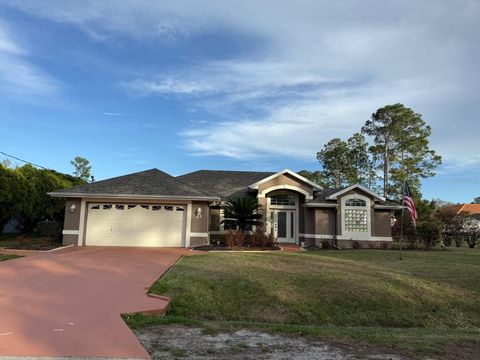 Photo of 23 Evansmill Lane, Palm Coast, FL 32164 (MLS # FC316723)