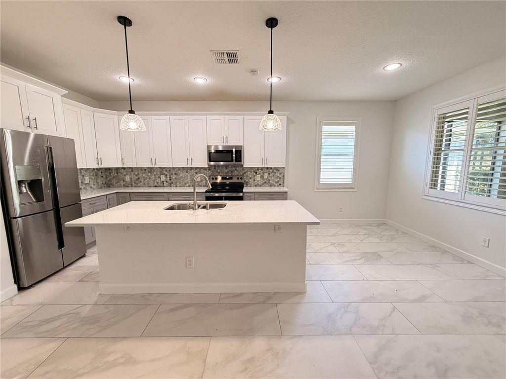 Photo of 2347 Crosston Circle, Orlando, FL 32824 (MLS # O6411341)