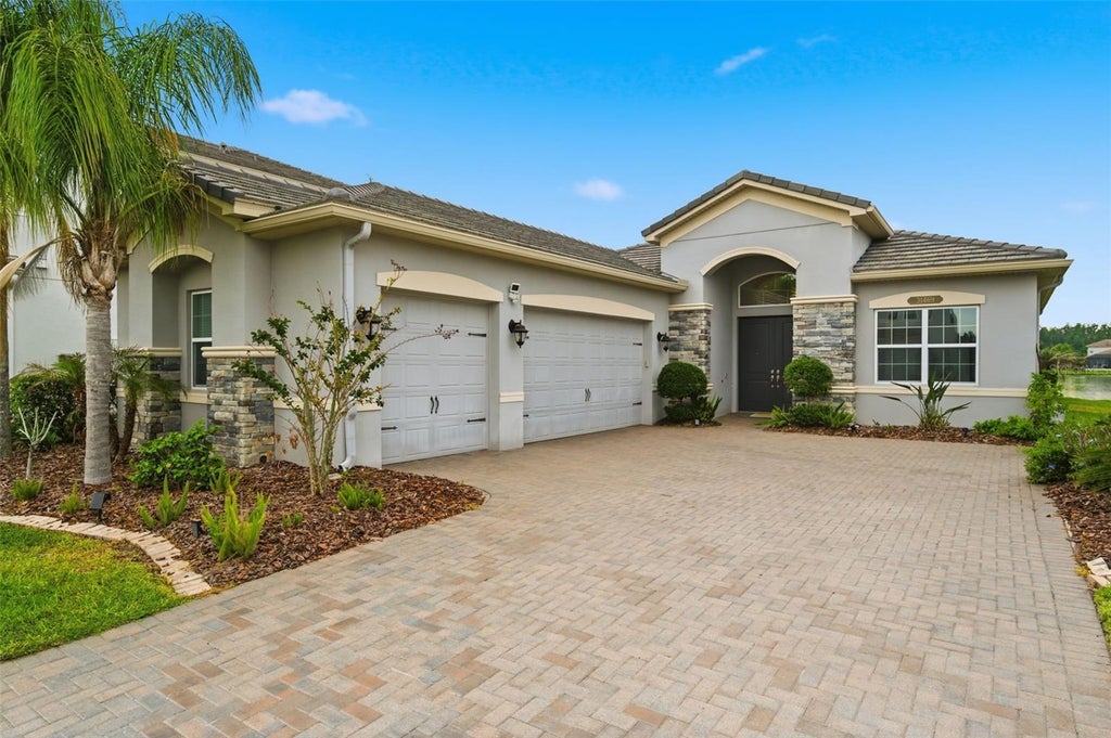 Photo of 31469 Chesapeake Bay Drive, Wesley Chapel, FL 33543 (MLS # TB8511902)