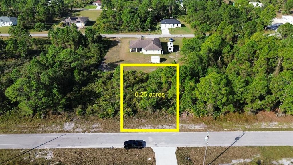 Photo of 710 Randall Avenue E, Lehigh Acres, FL 33974 (MLS # O6393757)