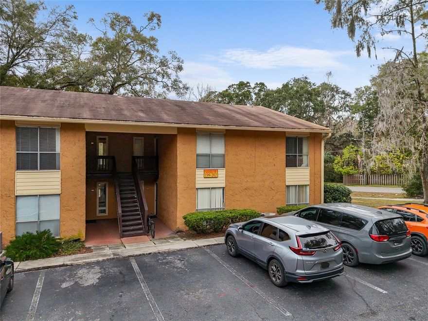 One or more photo(s) has been virtually staged. Welcome to this spacious 3-bedroom, 2-bathroom ground-floor condo in the sought-after Creeks Edge community. Enjoy the comfort of laminate wood and tile flooring throughout, NO Carpet! Flooded with natural light from numerous windows, this move-in-ready home features a large open space kitchen with wood cabinets, a stylish tile backsplash, and plenty of counter and storage space. The primary bedroom boasts abundant closet space, and the home includes a washer and dryer for added convenience. Step outside to relax on the screened porch or use the outdoor storage closet for your extras. Creeks Edge offers fantastic amenities, including a swimming pool, fitness center, clubhouse, tennis courts, and a sauna. Surrounded by mature trees and a beautiful creek, the community is just minutes from the University of Florida, UF Health, downtown Gainesville, and local shopping and dining options. In addition, it is also on a direct bus line to UF and Shands.