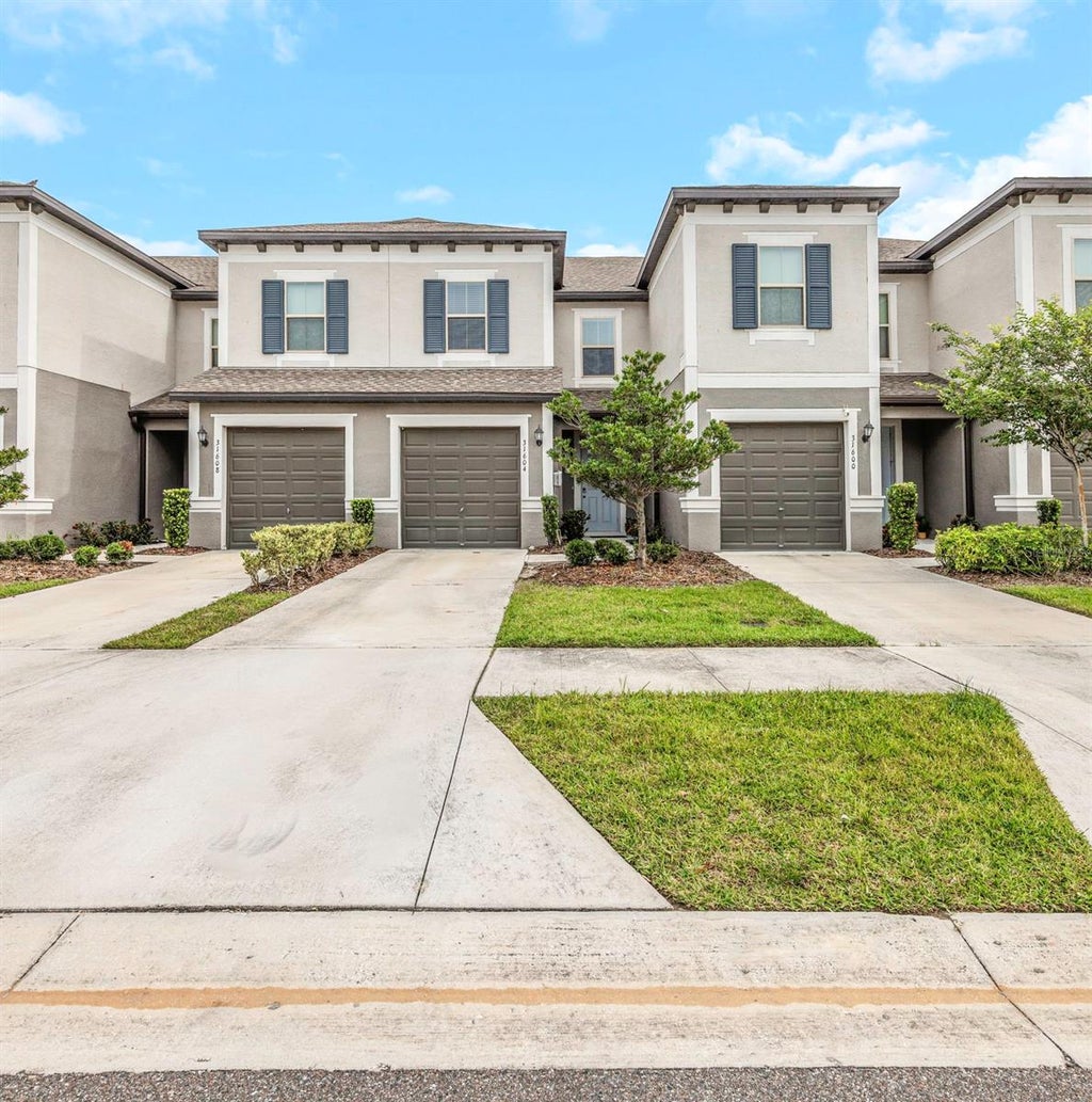 Photo of 31604 Blue Passing Loop, Wesley Chapel, FL 33545 (MLS # O6415896)