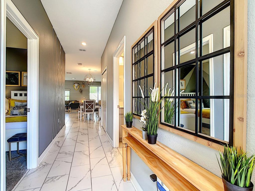 Photo of 302 Ocean Course Avenue, Davenport, FL 33896 (MLS # O6344021)