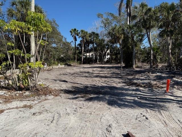 Dramatic price reduction on this beautiful residential lot on the south end of Longboat Key! One of the largest lots on Longboat! Easy walk to shops and restaurants. Close to the bay and Longboat's beautiful beaches. Artesian well on property.