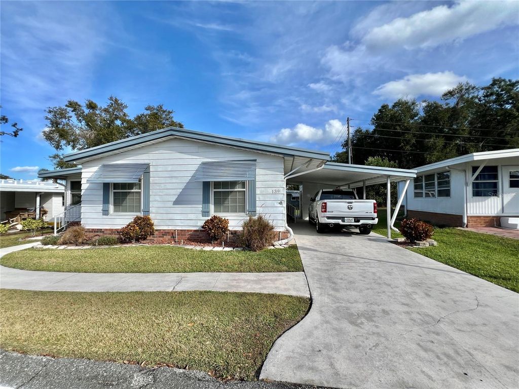 Photo of 139 Aspen Circle, Leesburg, FL 34748 (MLS # G5105815)