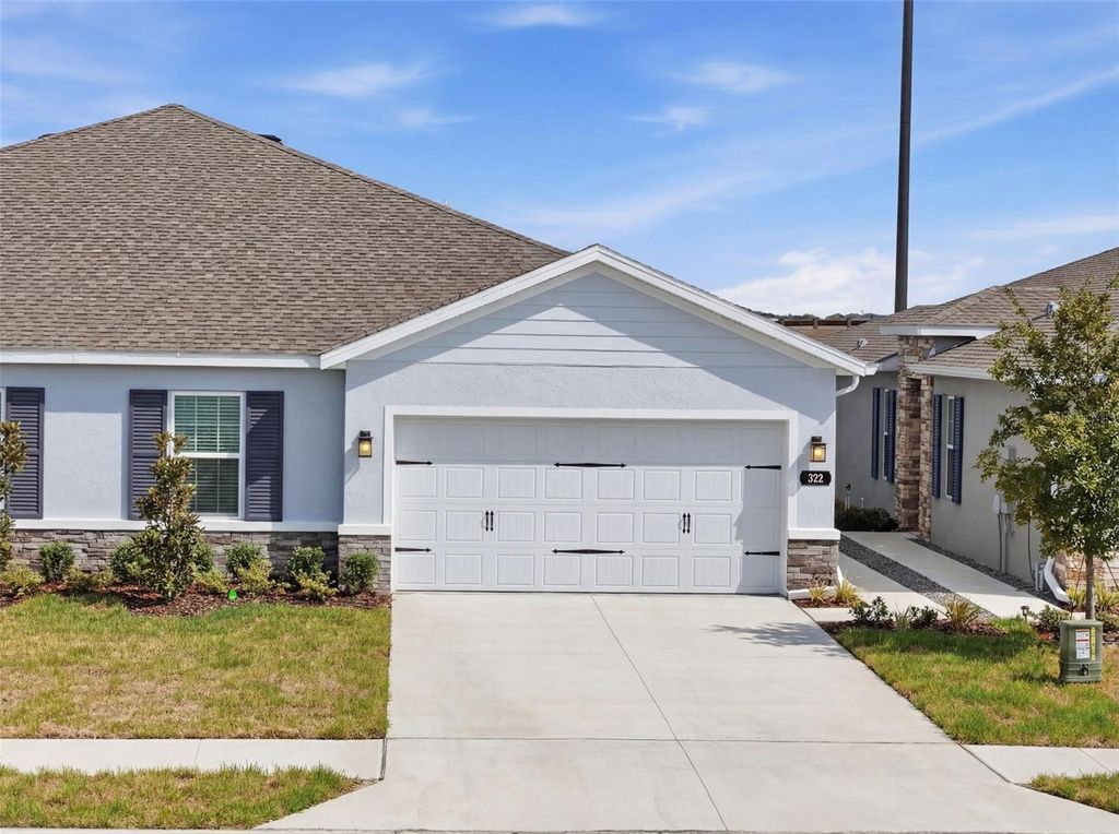 Photo of 322 Voltaire Drive, Spring Hill, FL 34609 (MLS # W7883500)