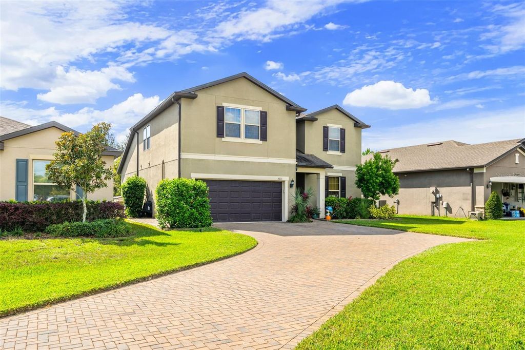 Photo of 5213 Brydon Woods Circle, Magnolia Square, FL 34771 (MLS # O6359225)