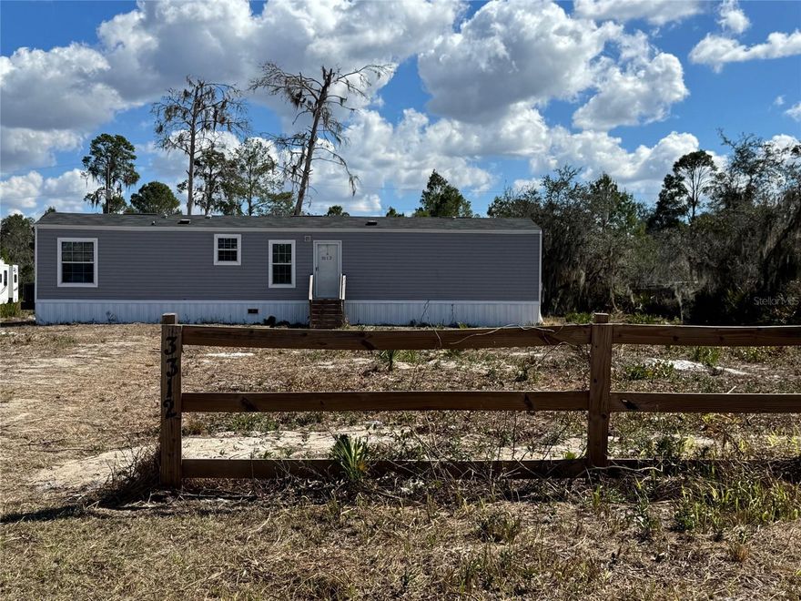 Are you looking for your own private piece of paradise at an affordable price? Look no further! Just off the beaten path, you can enjoy this 3-bedroom, 2-bathroom, diamond in the rough!  
Discover modern comfort and peaceful living in this beautiful 2019 manufactured home situated on over half an acre of private, partially fenced land. This property offers the perfect combination of space, style, and serenity. Call for your private showing today!