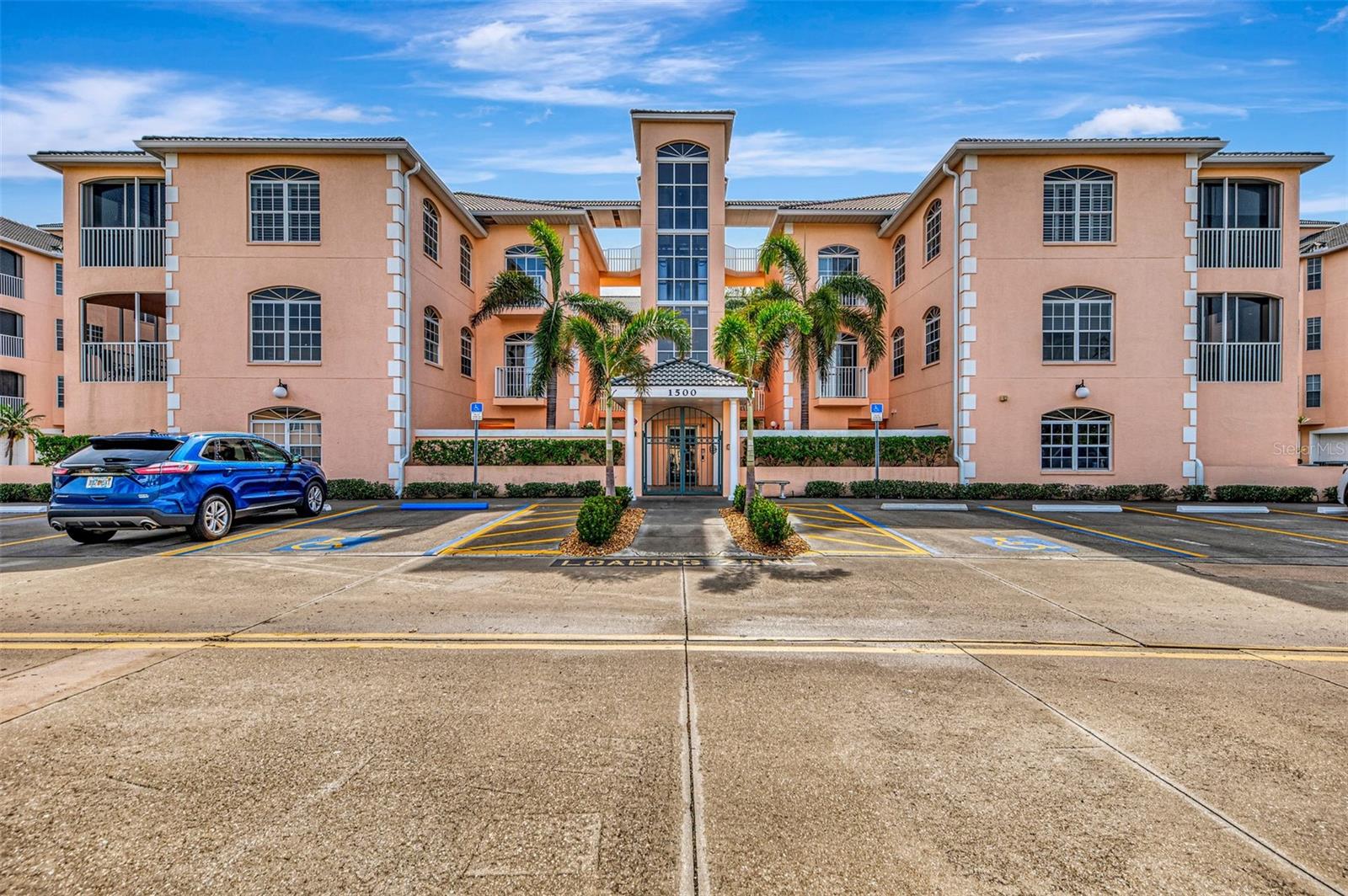 Attractive three bedroom, two bath condo with a two car garage, in desirable Courtyards at Gondola Park. Your condo has a spacious, open floor plan, with beautiful water views from the large lanai. Classy wood floors in all areas except the kitchen and lanai. The kitchen features Quartz counter tops, stainless appliances, closet pantry and breakfast bar. Sliders from the master bedroom to your lanai. The third bedroom has been converted to a study/library. The condo does have a split bedroom floor plan that lets you shut off the entire side for your guests. The Courtyards at Gondola Park offer a large heated community pool and clubhouse and a kitchen, overlooking the lake. Tennis courts as well as two different fitness rooms, a craft/library room and a game room in different buildings. You are directly across the street from Capri Isles Golf Course. Walking distance to grocery store and shopping center. Within a few miles to downtown Venice and beautiful Venice Beach. Come and see this great buy today!