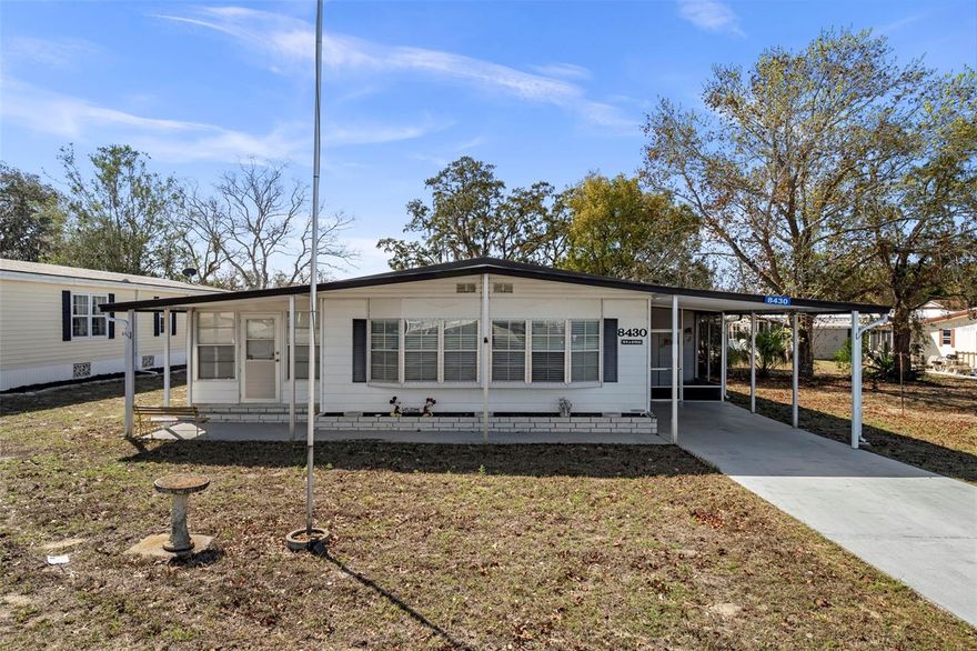 Charming move-in ready and furnished 2-bedroom, 2-bath home featuring a bright and spacious open floor plan perfect for comfortable everyday living and entertaining. This well-maintained home offers beautiful newer LVP flooring throughout. Huge utility room with ample storage space -- even room for a golf cart! Located in the vibrant, active 55+ High Point Golf Community offering tons of amenities such as Golf, tennis, pickleball, heated pool, social events and so much more with Low HOA fees and you OWN YOUR OWN LAND.**The settee/sofe in sunroom does not convey**