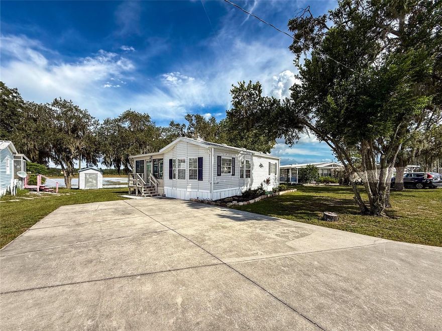 NO LOT RENT, it is a deeded lot, 2 bedrooms 1 Bath. A/C 2018 and Roof 2019 Roof, Owner replaced Roof and A/C . Horseshoes, Tennis, Community Pool, Miniature Golf, Shuffle Board, Basketball Court and much more. Dues include water & sewer. trash pickup & lawn maintenance from April 1 to October 1. Free internet at the clubhouse, free storage (subject to availability and upon request) for RV, Boat, Trailer etc