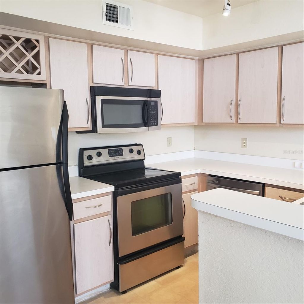 Photo of 7280 Westpointe Boulevard #831, Orlando, FL 32835 (MLS # O6409346)