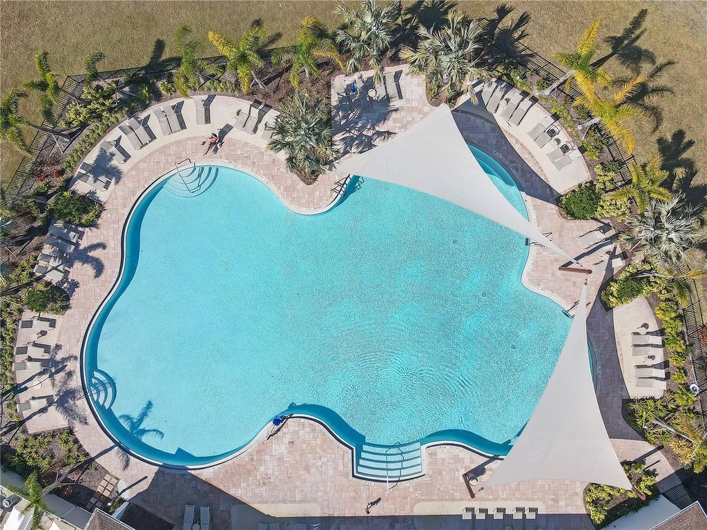 Photo of 5571 Margate Mill Bend, Wesley Chapel, FL 33545 (MLS # TB8343335)