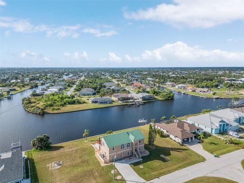Photo of 15340 Alsask Circle, Port Charlotte, FL 33981 (MLS # O6318315)