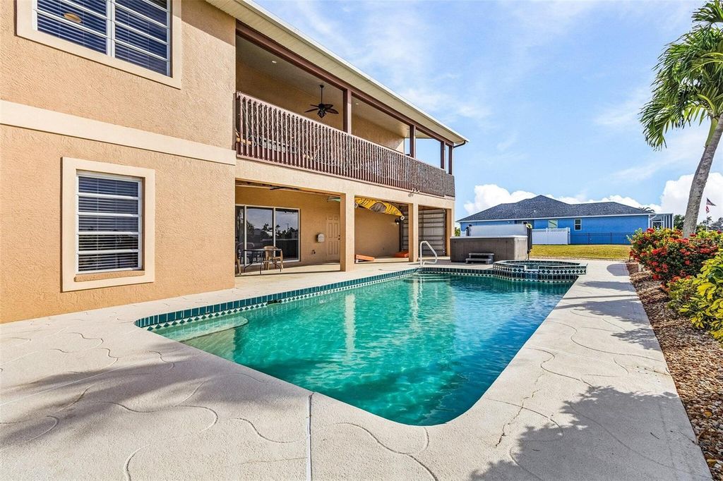 Photo of 15340 Alsask Circle, Port Charlotte, FL 33981 (MLS # O6318315)