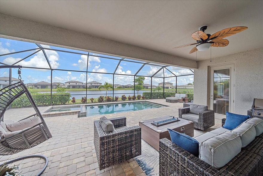 You will be proud to call this GORGEOUS home YOURS! The peaceful views of the lake are AMAZING and it shows like a model home! 
 
Each generously sized bedroom offers a cozy retreat, and the 3-CAR GARAGE provides plenty of room for vehicles and extra storage! This home is FILLED with UPGRADES, including: 
**Whole House Paint
**Upgraded Ceramic Tile Flooring
**CULLIGAN Water Softener 
**Tankless, Endless Hot Water Heater
**Levolor Automatic Blinds over Patio Doors
**Wainscoting in Dining Room
**Crown Moulding in Living Room and Primary Bedroom
**Decorative Tile on Backsplash and Island 
**Upgraded Light Fixtures
**Added Ceiling Fans in 4 Bedrooms, Living Room & Lanai. Next, step outside to your own little paradise! Enjoy a refreshing dip in the beautiful GAS-HEATED POOL and SPA with UPGRADED LANDSCAPING to provide LOTS OF PRIVACY! 

Don't tell your family and friends up North if you buy this home, because you will never get rid of Company! You will "LIVE ON VACATION in Lorraine Lakes! SO MANY FANTASTIC AMENITIES—* 24/7 gated security for peace of mind *a fully equipped Gym *RESORT STYLE POOLS *a fun splash pad! *Tennis *Pickleball  *Volleyball  *Basketball, and Bocce ball. Eat lunch or dinner at the Clubhouse or meet friends for drinks at the Clubhouse! Come see why Lorraine Lakes in Lakewood Ranch is the perfect place to call home! Lakewood Ranch is recognized as the #1 Master-Planned Community in the USA! Conveniently located near I-75, TOP "A" RATED schools, world-class dining, shopping, and entertainment, this prime location is just 30 minutes from Sarasota’s world-famous beaches. Don’t miss this rare opportunity to own a meticulously cared-for home in an exceptional community! "This life is not a dress rehearsal, live your best life and LIVE ON VACATION NOW!"