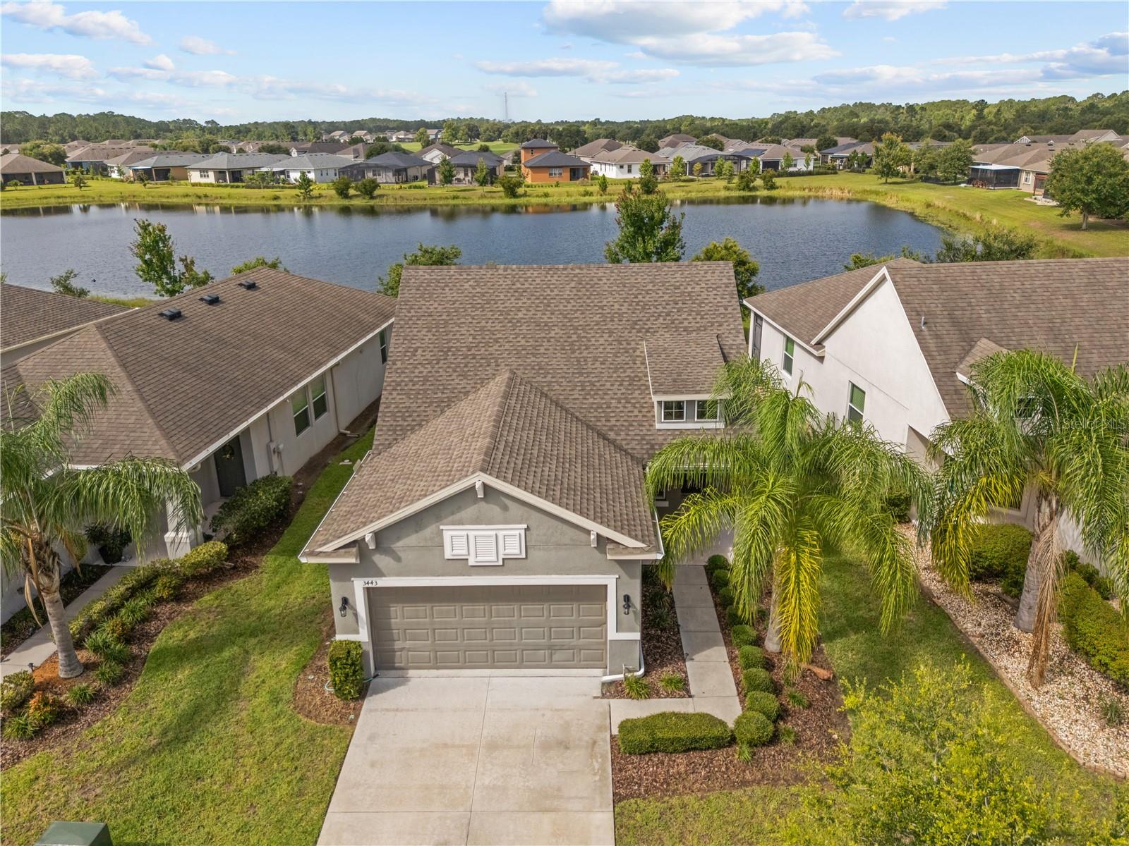 GREAT OPPORTUNITY TO LIVE IN THE LAKES AT HARMONY, a 55+ GATED GOLF AND NATURE LOVERS COMMUNITY. The CDD bond is paid off. The Lakes at Harmony is an Age-Restricted 55+ Community. This impressive model features a one-story home with two bedrooms, private office, two baths, and a two-car garage. This dynamic home offers the much sought-after open floor plan with family room, kitchen, and dining area. The beautiful kitchen features a quartz countertop, large pantry and the adjacent family room allows outdoor access to a lanai via sliding glass doors. The master bath includes a luxurious oversized shower and generous walk-in closet. There is an exclusive club house for “The Lakes at Harmony” which offers a zero-entry pool, fireplace, community gathering room, activities room and gym. Residents enjoy pickleball, tennis, bingo, book club, chess, tai chi and many other wonderful activities. Lakes residents also have access to 2 other pools, walking/hiking trails, an 18-hole Johnny Miller golf course, access to 2 natural lakes, boat rentals, farmers markets and yearlong activities in Town Square. The Lakes at Harmony is peaceful and serene, boasting natural beauty wherever you look from amazing sunsets to deer, cranes and turkeys. The Lakes is located in Harmony, an 11,000-acre development, surrounded by a conservation preserve, and is 40 miles SE of Orlando, 30 minutes to Orlando Airport, and 40 minutes to Disney and the beaches. HOA pays for yard maintenance and exterior pest control. Buyer to verify all room dimensions, square footage and HOA restrictions.