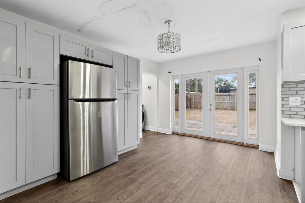 Photo of 6020 W Harwood Avenue, Orlando, FL 32835 (MLS # O6382661)