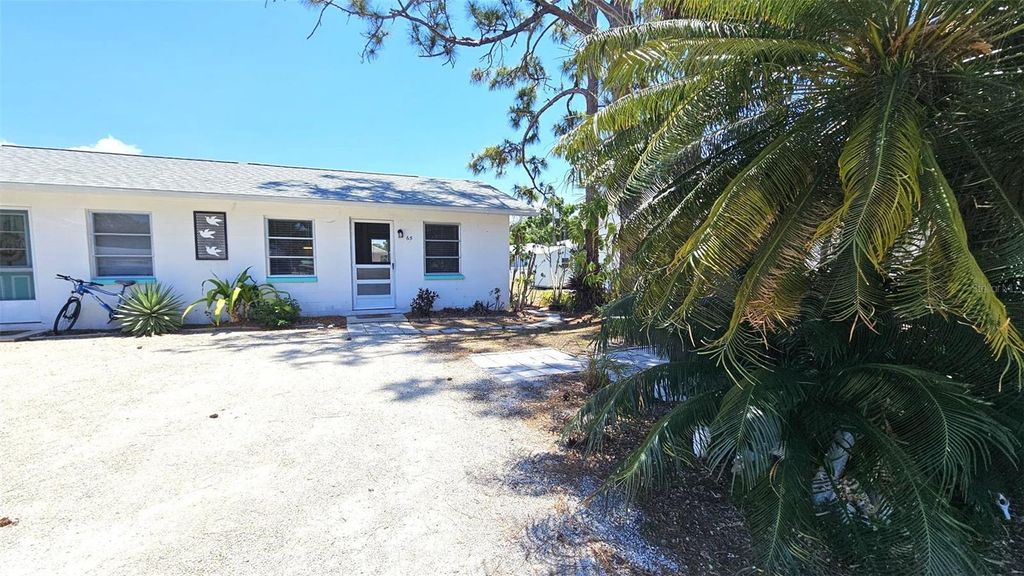 Photo of 65 N Maple Street, Englewood, FL 34223 (MLS # S5147585)