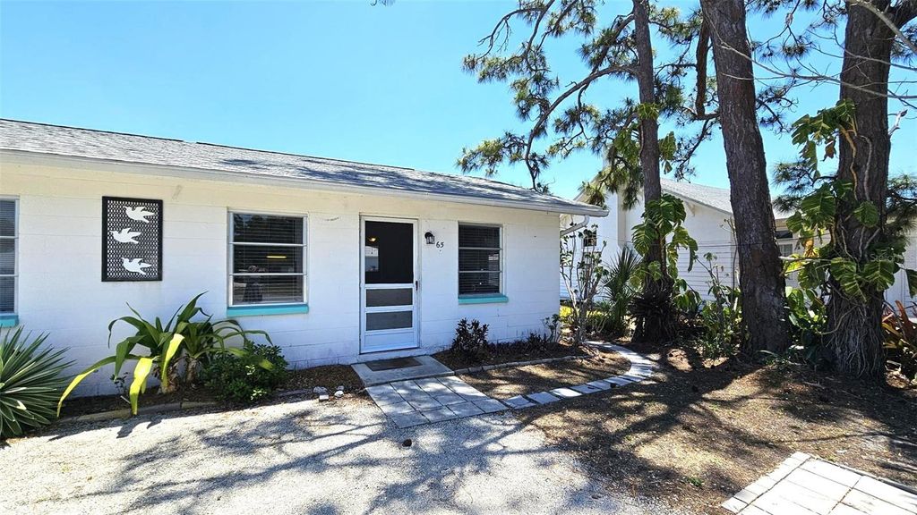 Photo of 65 N Maple Street, Englewood, FL 34223 (MLS # S5147585)