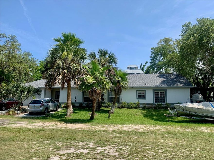 Located on peaceful quiet, street on Turnbull Bay, "Salem on Sunset" is a waterfront property full of potential.  Imagine seeing the sunset every evening as you unwind from the day in your backyard or on the dock. This home awaits your vision & design ideas to make it your own & offers a great location to enjoy sunsets & wildlife with small boat access to the Intracoastal.  Spacious floorplan with cathedral ceilings in livingroom, dining, kitchen, family room & master suite!  Large trellised porch is accessed from family room & master suite. Plantation shutters on some windows.   Two car garage. Interior laundry. Concrete construction.  Partially rebuilt dock.  Excess dock materials will stay.   Unique corner location provides for no neighbor on north side.  Roof new 2018, HVAC new 2017.  Paver driveway.   Look past the outside clean up that’s needed & view the interior to get the whole picture. It’s worth it. Whomever decides that “Salem on Sunset” is theirs, will be grateful every day to live in such a peaceful, restorative, waterfront environment.   Bring your vision, design ideas & imagination to see your dream of waterfront living come true. ;Water: City