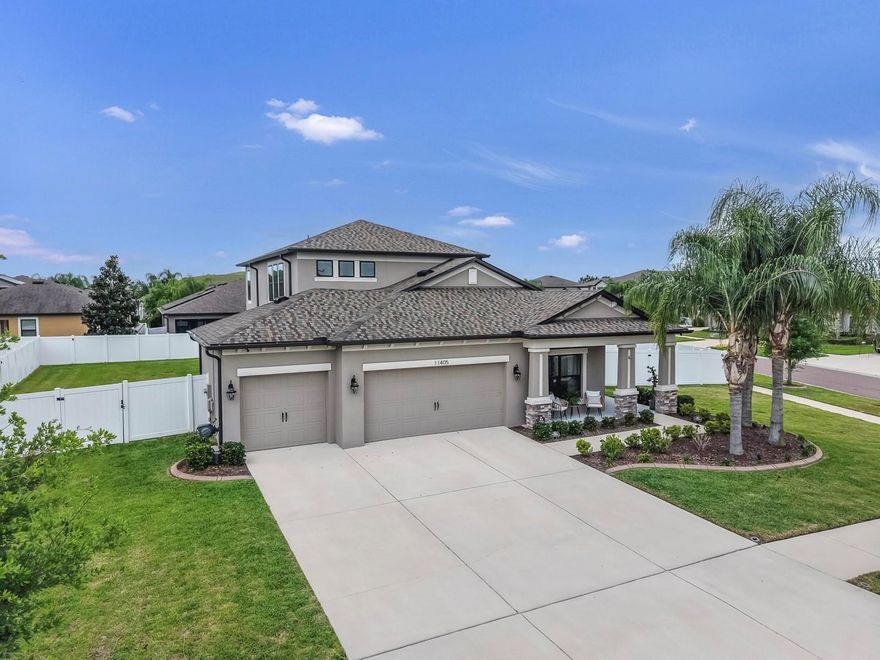 Welcome to one of the most unique & upgraded homes in South Fork Lakes Community with a Fully Upgraded NEW ROOF in 2025! 
Situated on the largest lot in the community and directly across from the amenity center, this M/I Picasso Bonus home offers a rare combination of space, convenience, and high-end customization that is nearly impossible to find at this price point. From the moment you enter, you will notice the difference. Soaring 10-foot tray ceilings, oversized 8-foot doors, and an open, thoughtfully designed layout create a sense of space and quality that stands apart from typical builder-grade homes. The home has been extensively upgraded throughout, including brand new luxury vinyl plank flooring with matching solid tread stairs, providing a seamless, modern look with durability built for real life throughout the entire lower level. The kitchen and main living areas flow effortlessly to the extended screened lanai, creating the perfect indoor-outdoor setup for Florida living. The lanai also features a commercial-grade stainless steel sink, making it ideal for grilling, entertaining, and easy cleanup. The kitchen features all new Samsung Bespoke Smart Appliances with interchangeable glass fronts. Smart features throughout the home for your convenience. One of the standout features of this home is the fully built-out upstairs bonus space, currently designed as a private home theater experience. Featuring elevated second-row seating, power reclining chairs, multiple display setups, smart lighting, and a dedicated snack and beverage area, this space delivers a true entertainment experience that will impress any guest. The theater setup is available as a negotiable feature, giving buyers the flexibility to move in with a fully equipped entertainment space or customize it to their own vision. Additional premium features include a rare three-car garage, upgraded finishes throughout, and a location that offers immediate access to the community pool, playground, gym, and recreational amenities just steps from your front door. This is not just another home in the neighborhood. It is a highly upgraded, move-in ready property designed for both everyday comfort and unforgettable entertaining. Homes with this combination of lot size, upgrades, and unique features rarely come available. This is a Must See Home - Schedule your showing today.