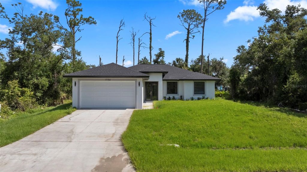 Photo of 17156 Eugene Avenue, Port Charlotte, FL 33954 (MLS # C7511322)