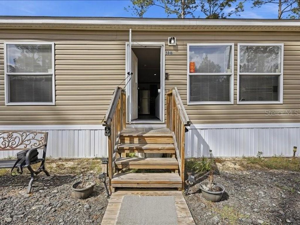 Photo of 5846 Mahogany Boulevard, Bunnell, FL 32110 (MLS # FC316806)