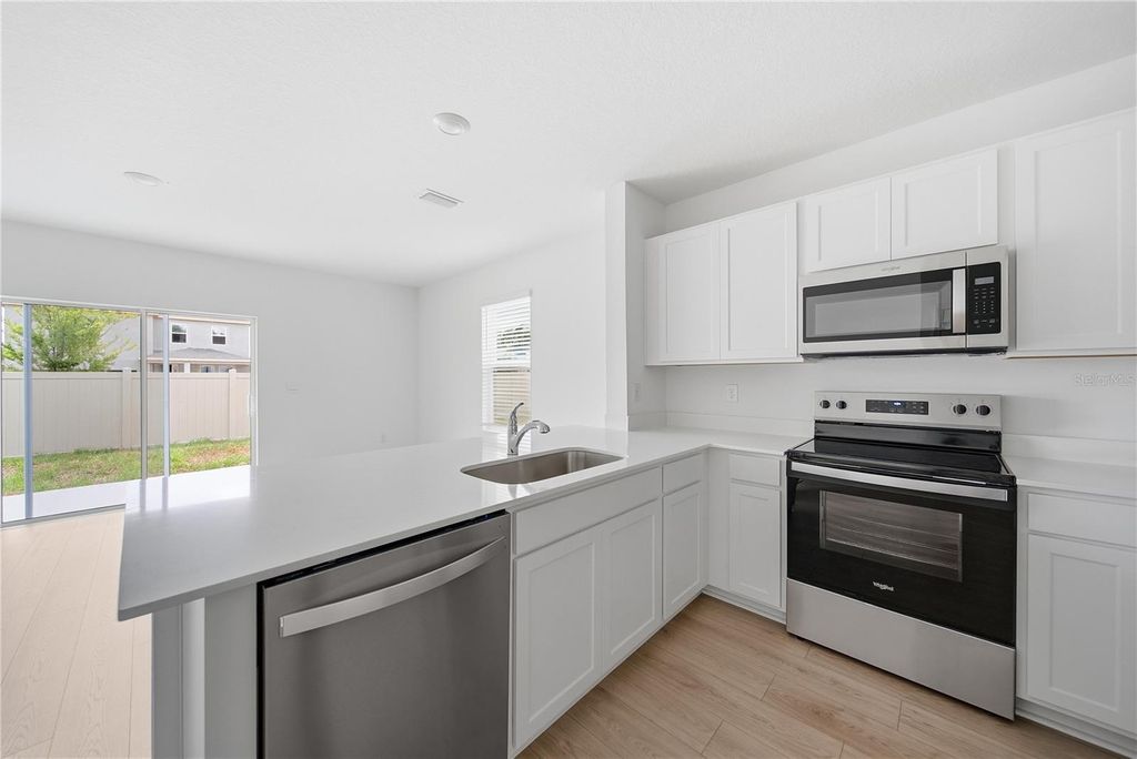 Photo of 32526 Midsummer Night Lane, Wesley Chapel, FL 33543 (MLS # TB8504799)