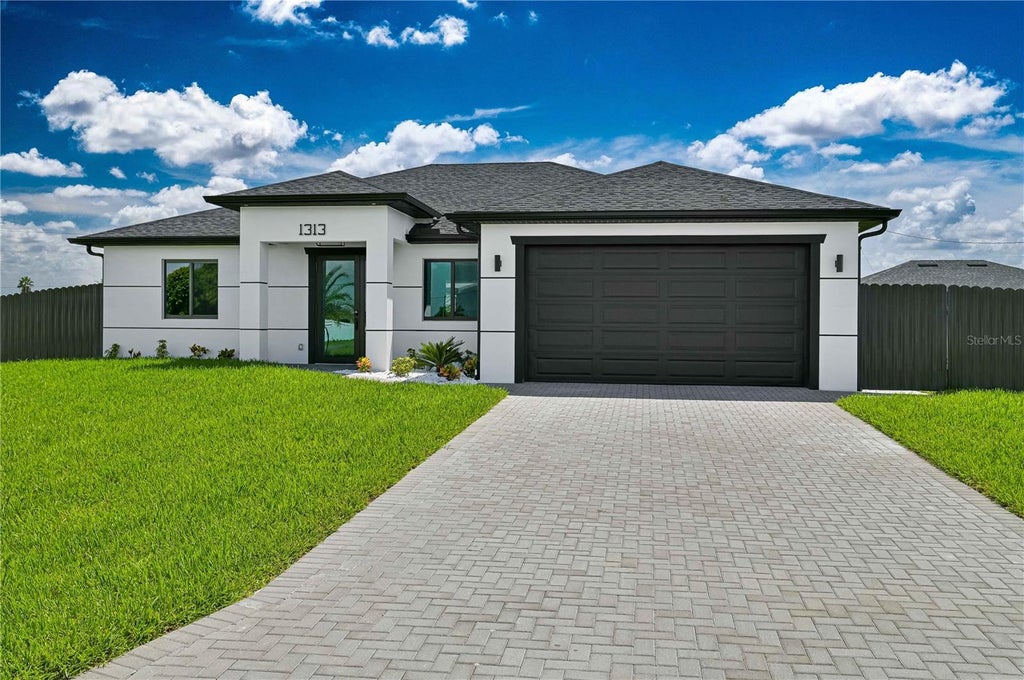 Photo of 1313 NE 7th Avenue, Cape Coral, FL 33909 (MLS # TB8543113)