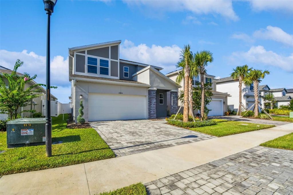 Photo of 31854 Asbury Avenue, Wesley Chapel, FL 33545 (MLS # TB8420481)