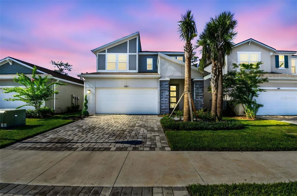 Photo of 31854 Asbury Avenue, Wesley Chapel, FL 33545 (MLS # TB8420481)