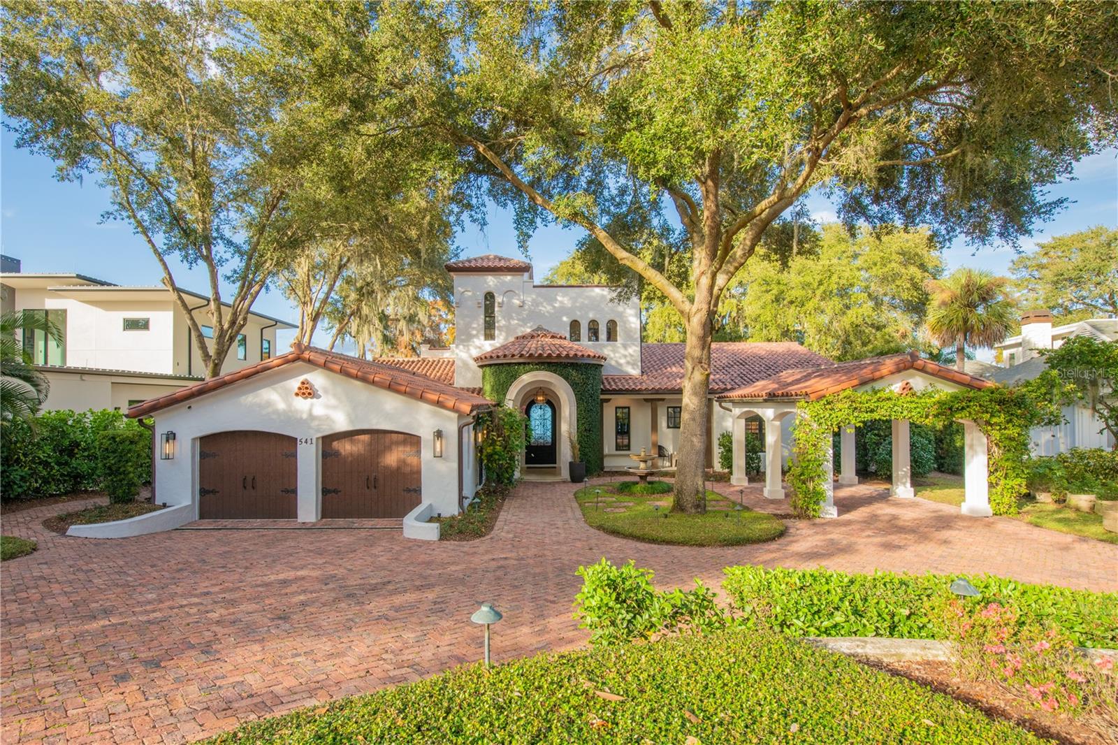 *Price Improvement* The sellers received an unexpected opportunity and are relocating out of state, so the house is priced to sell quickly. Walk in with instant equity in this once in a lifetime lake home.
Welcome to your dream home in the heart of Winter Park, Florida! Nestled in the prestigious Timberlane Shores neighborhood, this exquisite custom-built residence by Farina & Sons offers the perfect blend of luxury and tranquility. With 4 bedrooms, 3.5 baths, and a generous 4,725 sq ft of living space, this home is an Aurora and Parade of Homes Grand Winner and boasts 130 ft of lakefront frontage on the serene Lake Virginia. As you approach this stunning property, you'll find it situated on a quiet cul-de-sac, ensuring peace and privacy. Step into the backyard oasis, where a lanai with a gas fireplace invites you to unwind and enjoy Florida's beautiful weather. Relax in the hot tub or take a dip in the pool equipped with an Ultraviolet System which ensures the healthiest pool water possible, complete with an outdoor shower. The outdoor home lighting creates an enchanting ambiance, while the boat dock with a covered electronic boat lift offers easy access to water adventures. Experience breathtaking sunrises and sunsets over Rollins and Knowles Chapel from your own piece of paradise. The first floor of this home is designed for both comfort and style. Anderson doors and windows fill the space with natural light, highlighting the wood floors and architectural details like coffered ceilings with wood beams in the open family room. The master suite serves as a private retreat, featuring a spa bathroom, custom closets, and ample storage. Two additional bedrooms, a bathroom, and a half bath provide versatility and convenience. The kitchen is a chef's delight, boasting Caesarstone concrete countertops, a copper hood range, top-of-the-line Subzero and Viking appliances, walk-in pantry. A walk-in bar and wine room enhance the home's functionality, while a Pelican whole house water filtration system and a Kangen Leveluk water purifier ensure the highest quality water. The second floor is perfect for entertaining, offering a spacious area with a bonus room, bar, kitchenette, and an additional bedroom with an en-suite bath. This versatile space is ideal for hosting guests or creating a personal retreat. The city of Winter Park has approved plans to add an enclosed 385 square feet to the second floor, providing potential for additional space. Don't miss the opportunity to own this extraordinary lakefront home in one of Winter Park's most sought-after neighborhoods. Experience luxury living at its finest with unparalleled lakefront views, exceptional amenities and convenience to all the restaurants and shopping that Winter Park has to offer.