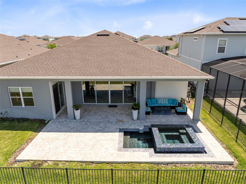 Photo of 13828 Tybee Beach Lane, Orlando, FL 32827 (MLS # O6405144)