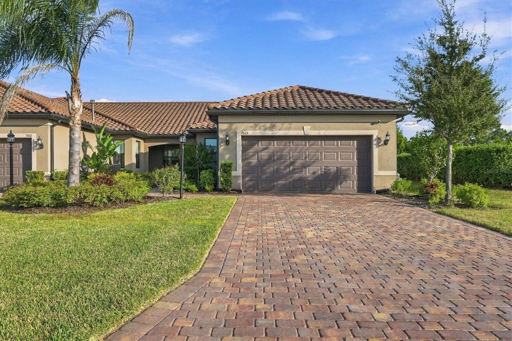 Photo of 7665 Summerland Cove, Lakewood Ranch, FL 34202 (MLS # A4711400)