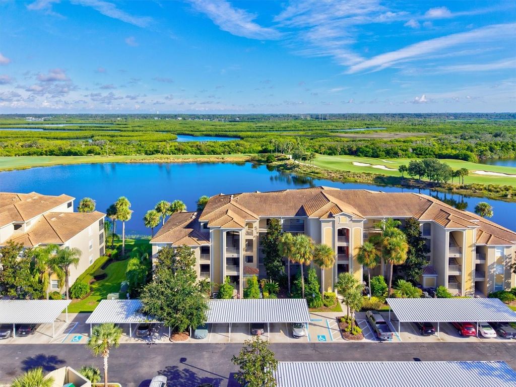 Photo of 7911 Grand Estuary Trail #303, Bradenton, FL 34212 (MLS # A4665873)