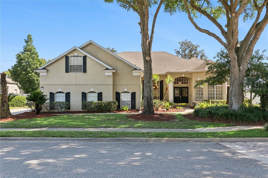 LOOK NO FURTHER- you have found the home of your dreams!! Located in the gated community of Berington Club, nestled between Lake Mary and Sanford, this beautifully maintained home offers the perfect blend of comfort, functionality, and style. Situated on an oversized corner lot with serene wooded views, the property welcomes you with abundant natural light, soaring ceilings, and spacious living and dining areas ideal for everyday living and entertaining.

The open-concept family room features a custom wine and coffee bar with designer backsplash, wine refrigerator, and custom cabinetry — creating a standout space for hosting and relaxing alike. The thoughtfully designed split floor plan offers generously sized bedrooms and a spacious primary suite complete with a large en suite bathroom.

Step outside to your private backyard retreat featuring a resort-style pool with beach entry, solar heating, paver deck, and an inviting outdoor fireplace — truly designed for year-round entertaining and enjoyment.

Additional highlights include an oversized upstairs bonus room perfect for a media room, game room, home office, or flex space. Conveniently located near shopping, dining, major highways, and within a highly sought-after Seminole County school district, this exceptional home offers the lifestyle you’ve been waiting for.