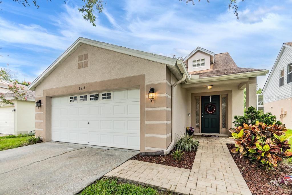 Welcome home to 8632 Hawbuck Street, located in the Thousand Oaks community of Trinity, Florida. This home boasts 4 bedrooms and 2 full bathrooms, perfectly blending style, comfort, and convenience. Walk up the nicely landscaped front entrance and into the main level living space, with a large family room for entertainment and relaxation, perfect for making family memories. The space flows seamlessly into a dining room and spacious kitchen with newer stainless-steel appliances and ample counter space and storage. Step outside through the sliding glass doors to your private backyard oasis with a patio and completely fenced-in yard backing up to a wooded conservation. The primary suite is also situated on the first floor with a spacious bedroom with tray ceiling and full bathroom with walk-in closet. Three additional bedrooms and a full bathroom await your family and guests on the second floor. The attached 2-car garage features a laundry area and additional storage. Newer roof (2018) and A/C replaced in 2023. This property is situated in a low-traffic neighborhood, yet in a prime location close to newer top-rated schools, new restaurants and shopping, medical facilities, local parks and playgrounds, an amazing YMCA facility with water park, and with easy access to SR54, US19, and the Veterans Expressway. This home is a rare find at a great price. Schedule your private showing today.