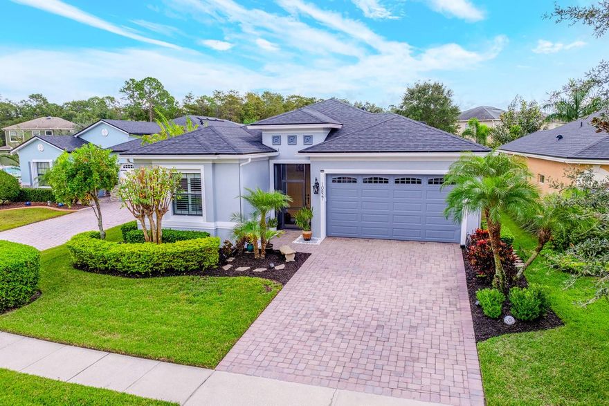 Seller may consider buyer concessions if made in an offer ~ Welcome to Woodland Lakes Preserve, a beautifully maintained GUARD GATED community in East Orlando surrounded by peaceful ponds, mature trees, and natural conservation areas! This lovingly maintained 3-bedroom, 2-bath home combines timeless style with thoughtful modern upgrades, offering comfort, function, and serenity on a spacious lot with a tranquil POND VIEW. Major UPDATES provide peace of mind and lasting value: a NEW ROOF (2024) with a transferable warranty, FRESH EXTERIOR PAINT (2023), NEW A/C (2022), NEW GUTTERS (2022), INTERIOR PAINT (2020), and a Smart Ecobee thermostat (2020). Inside, the owner has curated a fresh, neutral aesthetic with new faucets (2023), CUSTOM BALI PLANTATION SHUTTERS (2022), updated lighting (2020), and LUXURY VINYL PLANK flooring in the bedrooms (2020) paired with durable tile throughout the main living areas. The garage impresses with epoxy flooring and a whole-home surge protector already in place. Step through double front entry doors into a bright, OPEN FLOOR PLAN with high ceilings and elegant crown molding. The kitchen is the heart of the home, featuring STAINLESS STEEL APPLIANCES, granite counters, a large ISLAND with bar seating, recessed and pendant lighting, and a striking HERRINGBONE TILED BACKSPLASH – perfect for the home chef. The open living and dining areas flow seamlessly toward the SCREENED LANAI, where dual ceiling fans invite you to relax and enjoy your FENCED BACKYARD. Your PRIMARY SUITE offers a lovely tray ceiling, three windows for abundant natural light, a WALK-IN CLOSET, and a custom BARN DOOR leading to a private en-suite bath. The SPLIT BEDROOM LAYOUT ensures privacy, with two additional bedrooms and a second full bath conveniently located between them off the foyer. The home is also pre-wired for surround sound speakers, making it ideal for entertaining or quiet movie nights in. Woodland Lakes Preserve offers fantastic amenities, including a COMMUNITY POOL and large playground, all within a well-kept, quiet neighborhood. Perfectly situated near Waterford Lakes Town Center, Lake Nona, Downtown Orlando, and the Orlando International Airport, with quick access to 417, 408, 528, Alafaya Trail, and SR 50. ***Furnishings are negotiable, making this light, bright, and thoughtfully updated home ready for you to move right in. Woodland Lakes Preserve welcomes you home - call today to schedule a tour!