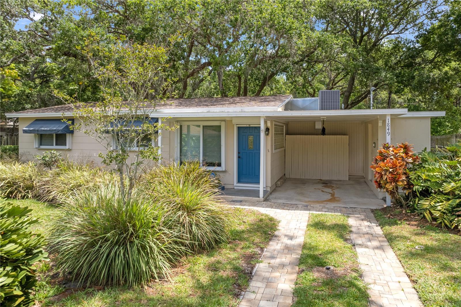 Location, Location, Location... This well maintained 3 bedrooms, 1 bathroom is located on the edge of Hammock Park in Dunedin. It has been lovingly care for by the previous own for the last 30 years. The bathroom and kitchen have been updated, as well as new windows with electronic hurricane shutters. Enjoy cooking in the kitchen while you overlook the back yard that leads into Hammock Park. Ceramic tile through the home, with a separate den/study off of the main house. Enjoy Florida weather in the screened in back patio that leads into the fenced in back yard with an incredible view of the park, there is a gate at the back of the property to enter the park from your backyard! There's plenty of wild life to watch and enjoy. Get in your golf cart and go explore... off to the Honeymoon Island Beach or downtown Dunedin. Enjoy all the activities the Dunedin Community Center provides... from Wine tasting to Art shows, baseball fields, "Sprayground" (kid's sprinkle park), Play ground, tennis courts. . You'll never run out of things to do! Close to the Pinellas Trail, shopping, restaurants, beaches, main throughways, airports and more. ROOF 2019 HVAC 2016, Hurricane shutters 2018, Home Renovations 2005 - all work permitted and in public records.