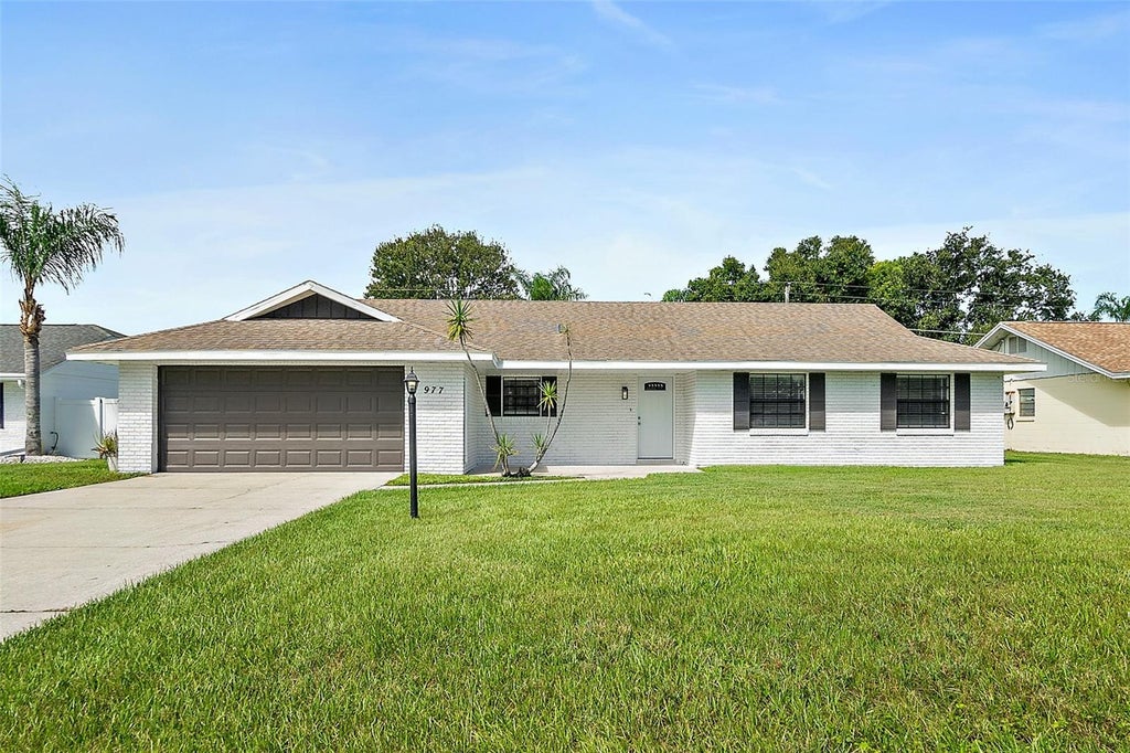 Photo of 977 Whiporwill Drive, Port Orange, FL 32127 (MLS # V4951108)